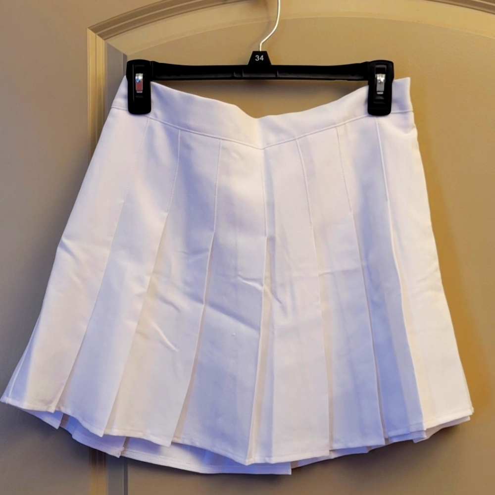 White pleated skirt with shorts